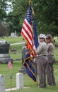 Female Veterans in uniform with American Flag