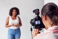 Female Videographer Recording Woman Recording Podcast In Studio Royalty Free Stock Photo