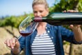 Female vintner pouring wine in glass Royalty Free Stock Photo