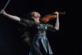 Female virtuoso violin player Royalty Free Stock Photo