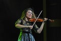 Female virtuoso violin player Royalty Free Stock Photo