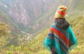 Female Visitor Enjoy a Stunning Aerial View of Aguas Calientes Town from Mt. Huayna Picchu, Machu Picchu, Cusco Region, Peru, Royalty Free Stock Photo