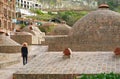 Female Visitor Walking Along the Medieval Sulfur Baths in the Old Tbilisi of Georgia