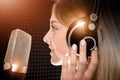 Female Voice Talent in Studio Royalty Free Stock Photo