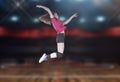 Female volleyball players jumping close-up on vollayball court. Royalty Free Stock Photo