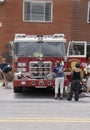 Female volunteer firefighters are polishing their fire truck