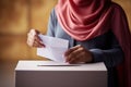 Female voter hand putting bulletin in ballot box. Generative AI Royalty Free Stock Photo