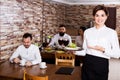 Female waiter showing country restaurant Royalty Free Stock Photo