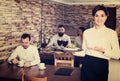 Female waiter showing country restaurant Royalty Free Stock Photo