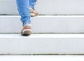 Female walking upstairs Royalty Free Stock Photo