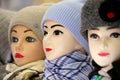 Female warm knitted hats and neckerchiefs on mannequins Royalty Free Stock Photo