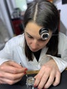 Female Watchmaker at work