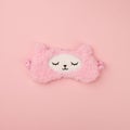 Female wearing cute kawaii sleeping band pink lama, trendy soft pastel pink on empty background. Top view Soft comfortable