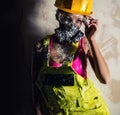 Female wearing a respirator posing indoors Royalty Free Stock Photo