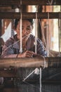 Female weaver at loom, Inle Lake, Myanmar