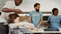 Female wheelchair User Gets Food Aid Royalty Free Stock Photo