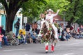 Female in a white cowboy outfit