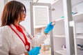 Female woman  Doctor  nurse  holding a syringe while standing in a medical office Royalty Free Stock Photo