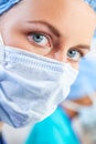 Female Woman Doctor Surgeon Wearing Scrubs and Surgical Mask