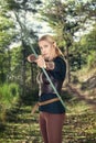 female wood elf shooting a bow Royalty Free Stock Photo