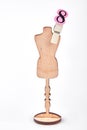 Female wooden mannequin and figure eight. Royalty Free Stock Photo