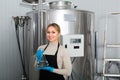 Female worker on beer brewery Royalty Free Stock Photo