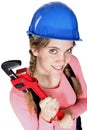 Female worker holding a wrench. Royalty Free Stock Photo