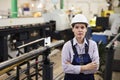 Female worker of large metalworking production