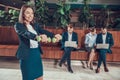 Worker posing exercising with dumbbells in office. Royalty Free Stock Photo