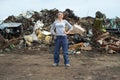 Female worker posing at scrap yard Royalty Free Stock Photo