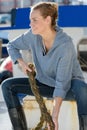 female worker with rope on harbourside Royalty Free Stock Photo
