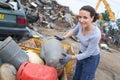 Female worker at scrap yard Royalty Free Stock Photo
