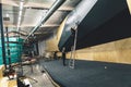 Female worker setting new briar climbing holds in the climbing gym