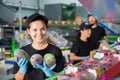 Female worker showing ripe mango Royalty Free Stock Photo