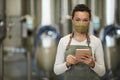 Female Worker Wearing Mask at Food Factory Royalty Free Stock Photo