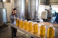 Female worker working in oil factory Royalty Free Stock Photo