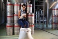 Female worker writing on clipboard in factory Royalty Free Stock Photo