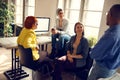 Female workers with manager in office Royalty Free Stock Photo