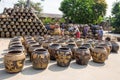 Female workers washing Dragon pattern flower pots.