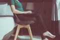 Woman working on laptop while sitting on chair at home,Happy and smiling,Enjoying time,Close up Royalty Free Stock Photo