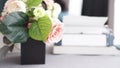 Female workspace with flowers bouquet on white background. Womens office desk