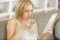 female writer drinking cup coffee Royalty Free Stock Photo