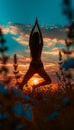 Female yoga practitioner in tree pose at sunset in a tranquil and serene open field