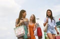 Female young friends doing shopping in the city. Royalty Free Stock Photo