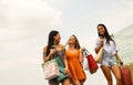 Female young friends doing shopping in the city. Royalty Free Stock Photo