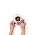 Femalewoman hand hold a white espresso cup with coffee isolate Royalty Free Stock Photo