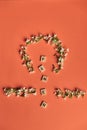 Femen on wooden alphabet, symbolizing woman gender and equality