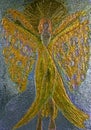 Feminine black angel with long dress and wings on metallic background.