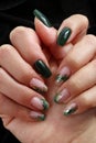 Feminine decorated nails with green colors