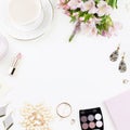 Feminine flat lay with woman fashion accessories, lingerie, jewelry, cosmetics, coffee and flowers. Top view Royalty Free Stock Photo